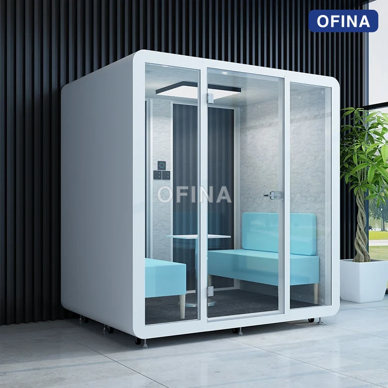 Cabin cách âm BLF-03 vỏ trắng đặt trong văn phòng — băng ghế bọc nỉ xanh